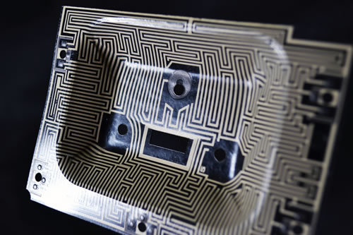 Complex sensor circuit printed onto plastic injection molding housing